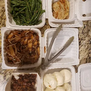 Green onion pancake, green beans, beef chow fun, spiced stewed pork over rice, bbq pork bun