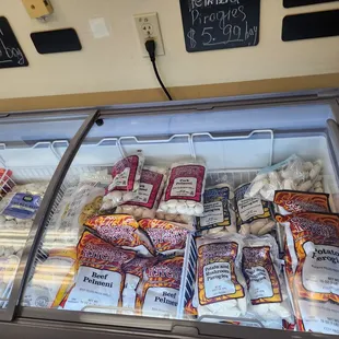 a display case filled with different types of food