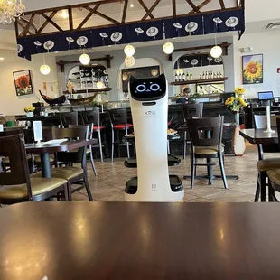 a table and chairs in a restaurant