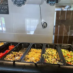 a buffet with a variety of food items