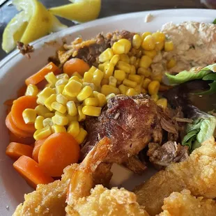 Pulled Pork, butterfly shrimp, carrots and corn