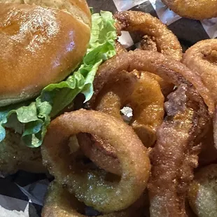 Chicken club with onion rings. Grilled chicken perfectly done huge sandwich and very tasty onion rings with a good crunch.