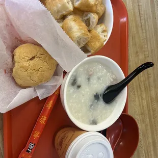 Chinese donuts, congee, Chinese bun, and coffee