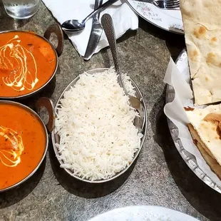 Two chicken Tikka masala (one hot and one medium), basmati rice, and plain naan.