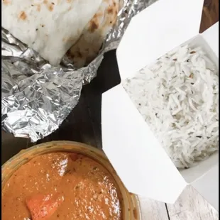 a tortilla and a bowl of sauce