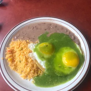Rice, beans, tortillas, eggs, verde sauce