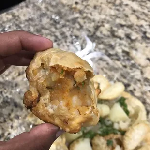 Worst samosas I ever had. It was just potatoes chili powder and some peas mixed and stuffed. No flavor at all