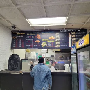a man standing at the counter