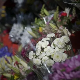 a bunch of flowers for sale