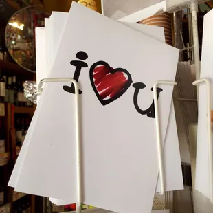 a stack of i love you cards