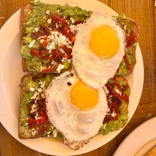 Avocado toast with sunny ups