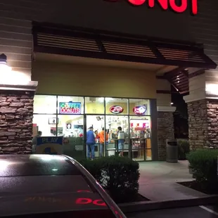 a car parked in front of the store