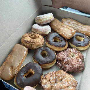 Dozen donuts chocolate -maple-apple fritter-jelly