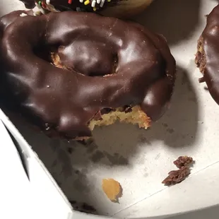 chocolate frosted donuts with sprinkles