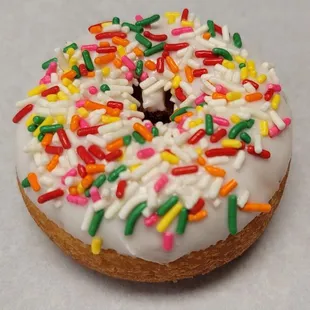 a frosted donut with sprinkles