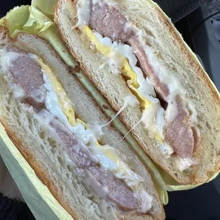 Large sausage, egg and cheese croissant sandwich