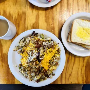 Campfire scramble (full-size) with bacon white toast and a cup of coffee
