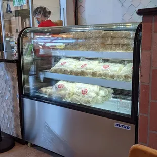 a display case of baked goods