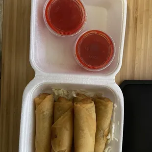 4 Pieces Egg Roll with one hiding under the 3rd roll from the left.