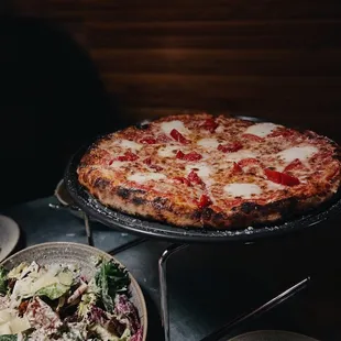 Tasty pizza and Caesar salad at Sunny Hill in Sunset Hill.