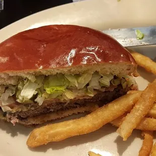 Black and blue burger with fries
