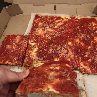 Just to show you how thin it is but still can taste the pizza dough.