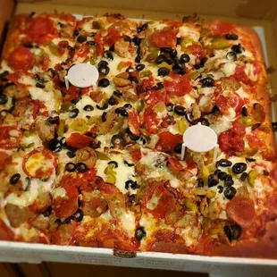 Everything pie with olives instead of mushrooms...