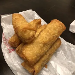 a pile of fried food on a piece of wax paper