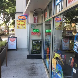 a storefront with a sign in the window