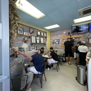 Interior view featuring local made  artwork available for purchase.
