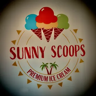 a logo with three scoops of ice cream