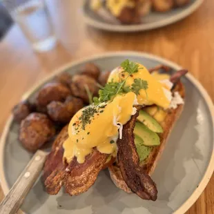 Wealthy pig Benedict (bacon was so crispy it was borderline burnt, blah)