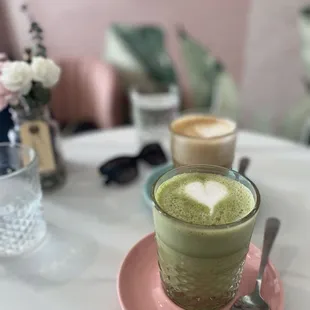 Matcha latte and regular oat milk latte