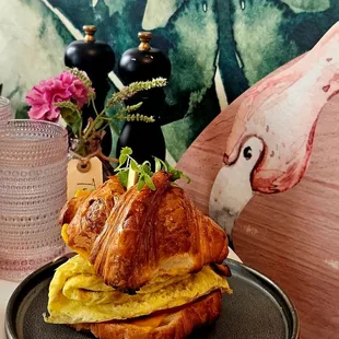 The Breakfast Sandwich was loaded with eggs, bacon, avocado, cheese in a Croissant.