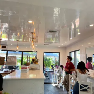 a group of people eating in a restaurant