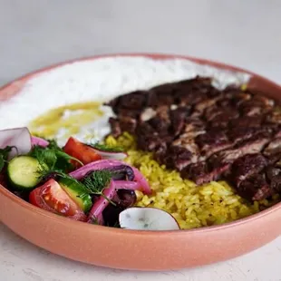 Sunset Steak Bowl | Aged Ribeye, Garlic Butter Rice, Tzatziki, Cucumber &amp; Tomato Salad