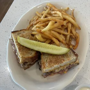 Patty Melt | Sunny Spread, Cheddar Cheese, Swiss Cheese, Grilled Onions, Rye, French Fries