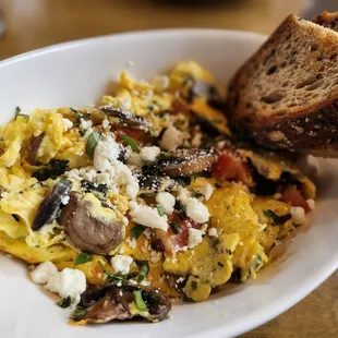 an omelet with mushrooms and feta cheese