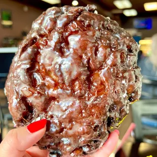 Apple Fritter. Starts of crunchy with a burst of cinnamon apple folded within a moist and doughy interior of the fritter.