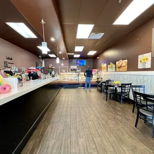 Interior. Donut display case towards the back.