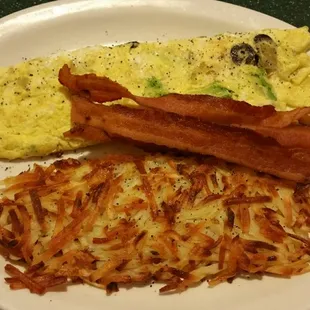 Avocado, olive, green chili and cheese omelet, side of bacon, hash browns. Yum!