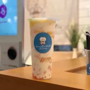 a cup of iced tea on a counter