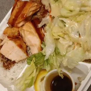 Salmon teriyaki, salad comes in separate container for crispness, but it&apos;s so much better when eaten together.