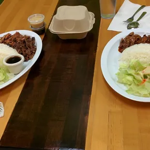 beef and pork teriyaki with egg rolls on the left, and chicken teriyaki on the right, at Sunny Teriyaki in Ballard, Seattle, WA