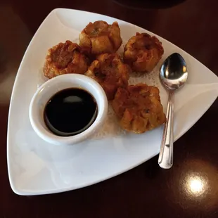 Thai Shumai - Fried Thai version of dumpling filled with pork &amp; shrimp, water chestnut, carrots, white onions, shiitake mushrooms $11.99