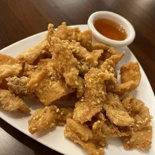 Fried chicken skin with sweet n sour sauce