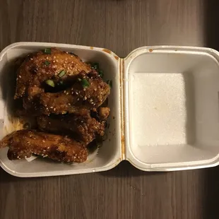 chicken wings in a styrofoam container