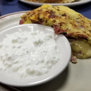 Corned beef omlette with Swiss cheese and a side cottage cheese.