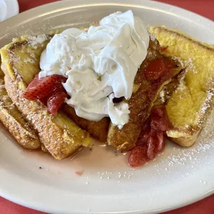 French toast with strawberries, whip cream