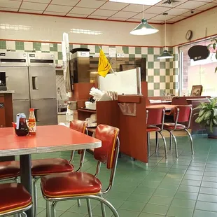 a view of the kitchen and dining area